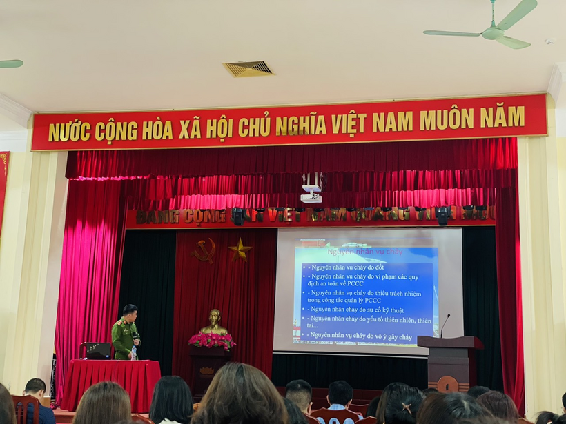 A picture containing text, person, people, groupDescription automatically generated