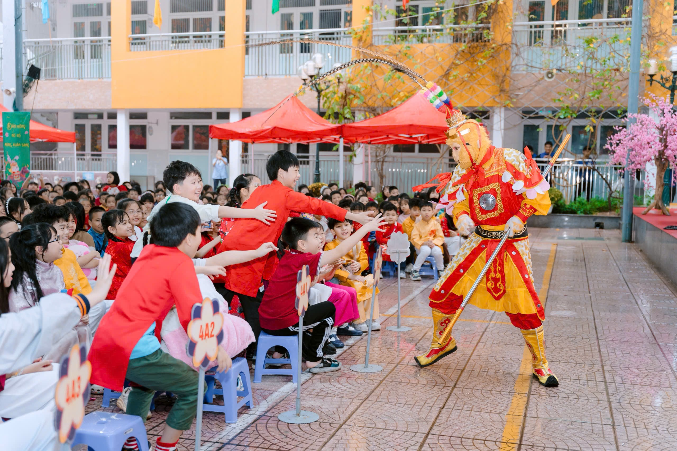 A group of people in a courtyard
Description automatically generated