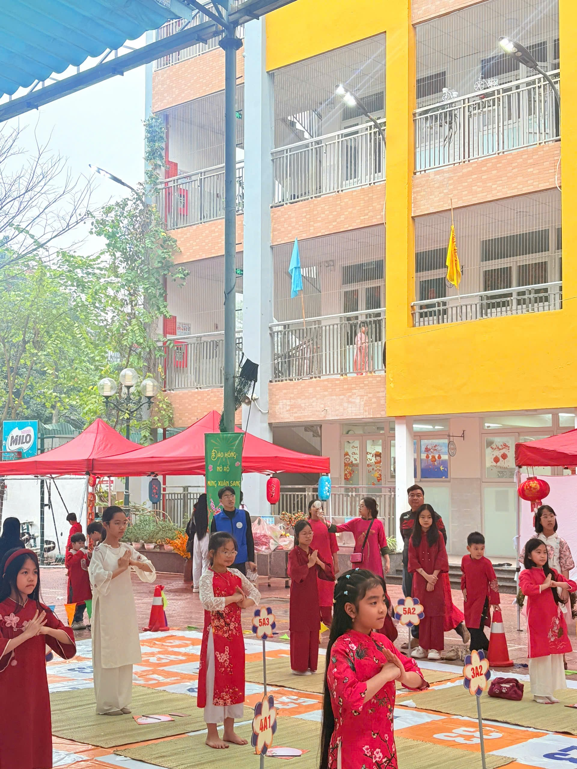 A group of people in red dresses
Description automatically generated