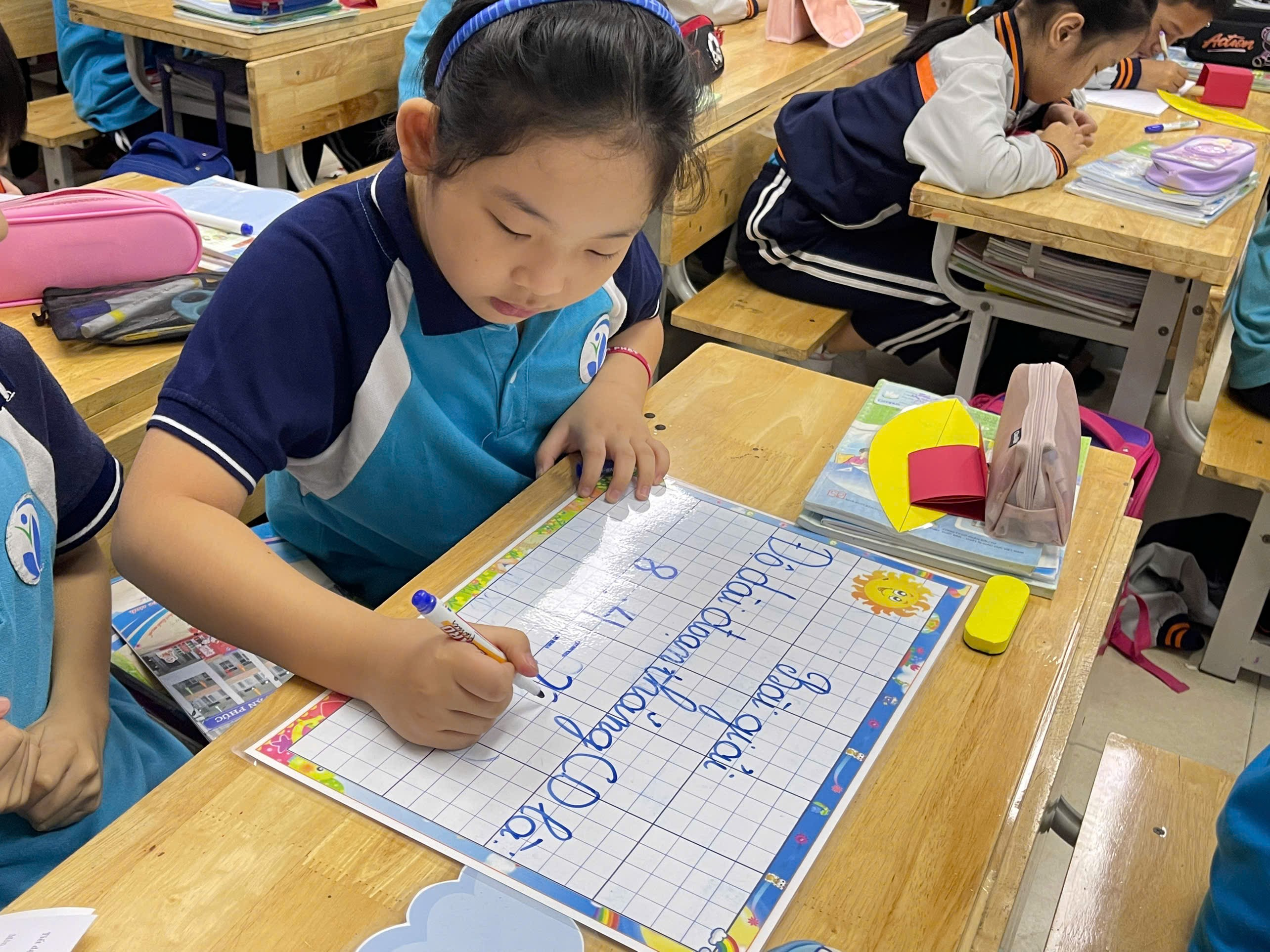 A child writing on a paper

Description automatically generated