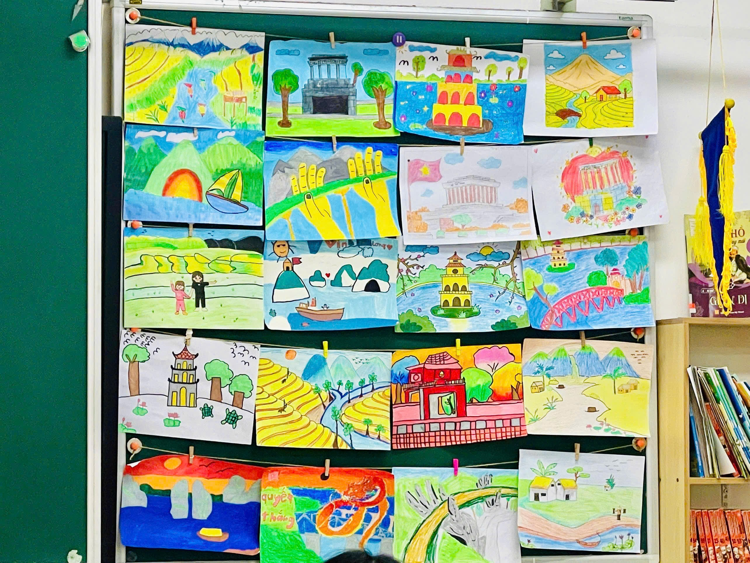 A group of drawings on a board

Description automatically generated